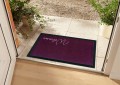 Wycieraczka-antyposlizgowa-45x75cm-z-rantem-kolor-fioletowy-WELCOME-Kod-producenta-104506-LILA.jpg