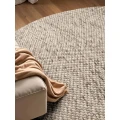 Dywan-welniany-okragly-200cm-naturalny-kremowo-bezowy-tkany-recznie-tkany-Marka-Elle-Decoration.jpg